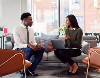 A woman interviewing a man for soft skills